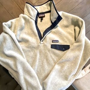 Fleece snap up pullover by Patagonia. Not a zip up. Snaps up.